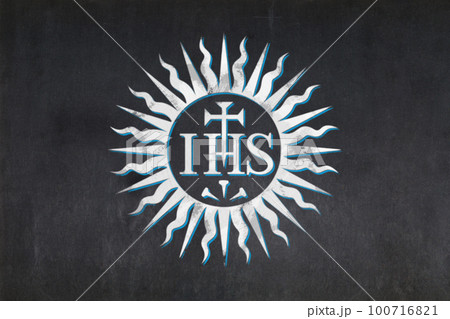 Christogram of the jesuitsdrawn on a blackboard 100716821