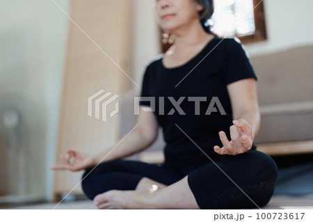 stress relief, muscle relaxation, breathing exercises, exercise, meditation, portrait of Young Asian woman relaxing her body from by practicing yoga 100723617