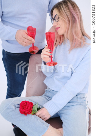 Young beautiful woman leaning on her man. Love concept. Love celebration. Young beautiful woman leaning on her man. Love concept. Love celebration. 100731823
