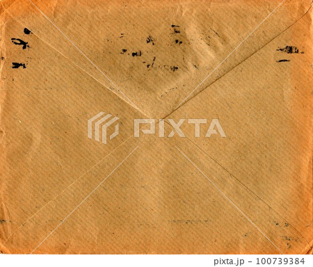 Back of an old used envelope. Rich stain and paper details. Can be used as background Back of an old used envelope. Rich stain and paper details. Can be used as background 100739384