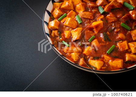 Mapo Tofu - The traditional Sichuan dish of silken tofu and ground beef, packed with mala flavor from chili oil and Sichuan peppercorns. 100740621