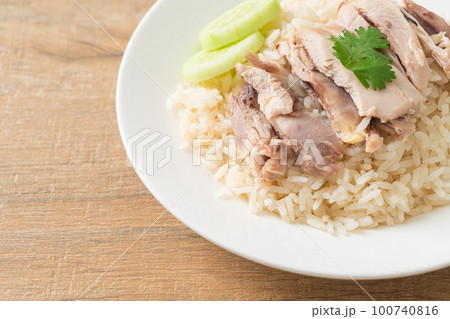 Hainanese Chicken Rice or steamed rice with chicken 100740816