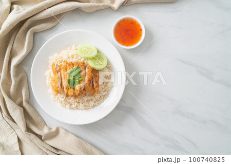 Steamed Rice with Fried Chicken or Hainanese Chicken Rice 100740825