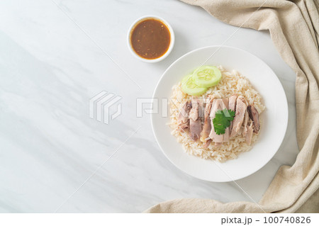 Hainanese Chicken Rice or steamed rice with chicken 100740826