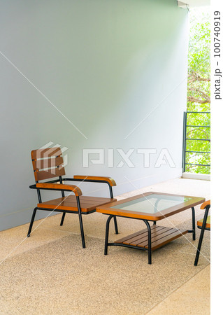 empty wood chair on balcony empty wood chair on balcony 100740919