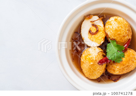Fried Boiled Egg with Tamarind Sauce 100741278