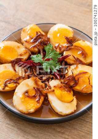 Fried Boiled Egg with Tamarind Sauce 100741279