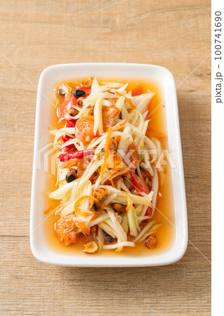 Som Tum - Spicy papaya salad Som Tum - Spicy papaya salad 100741690