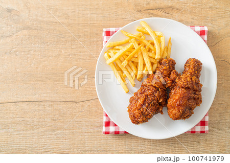 spicy Korean fried chicken with fries 100741979