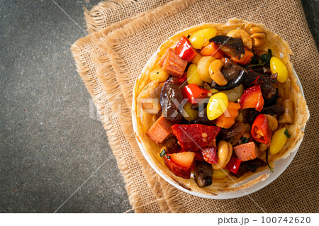 Stir fried mixed Chinese fruits .and nuts 100742620