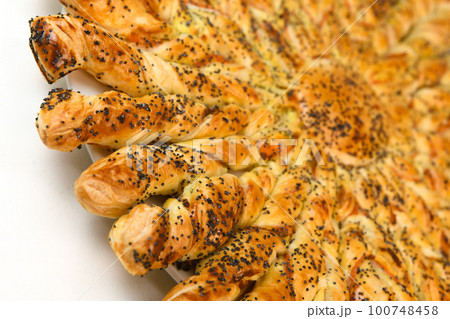 Sun recipe in puff pastry with smoked salmon and boursin cheese 100748458