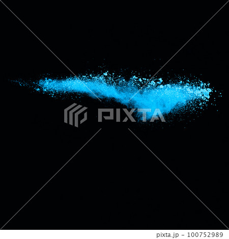 Blue dust explosion on black background. Freeze motion of color powder splash. 100752989