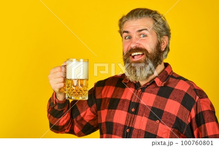 Adding joy in life. Mature bearded man hold beer glass. Happy birthday concept. Make sip. Leisure and celebration. Man drinking beer in pub. Beer brewery. Hipster drink beer. Celebrate with alcohol 100760801