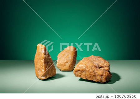 Natural green concept background, podium for product presentation. Mockup for the demonstration of cosmetic products with copy space. 100760850