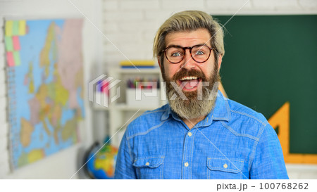 modern education concept. develop logic and creativity. start the brain engine. physics research. math teacher at board. education. exact sciences. happy bearded teacher in glasses. back to school modern education concept. develop logic and creativity. start the brain engine. physics research. math teacher at board. education. exact sciences. happy bearded teacher in glasses. back to school 100768262