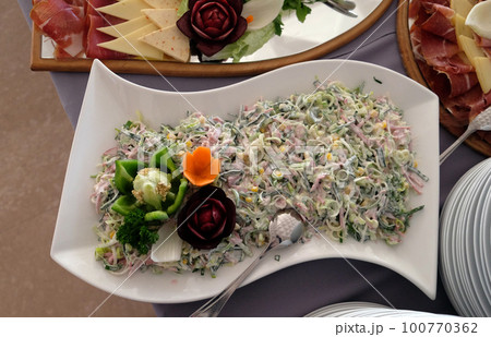 Classic Croatian plate with fine salad with ham Classic Croatian plate with fine salad with ham 100770362