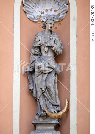 Virgin Mary on the portal of Dreifaltigkeitskirche ( Holy Trinity ) church in Graz, Styria, Austria Virgin Mary on the portal of Dreifaltigkeitskirche ( Holy Trinity ) church in Graz, Styria, Austria 100770439