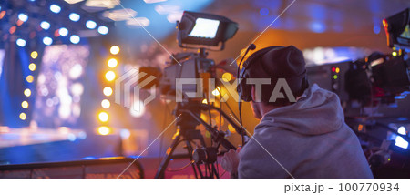 cameraman on the set of a TV show cameraman on the set of a TV show 100770934