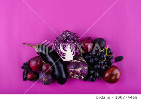 Assortment of purple vegetables and fruits 100774468