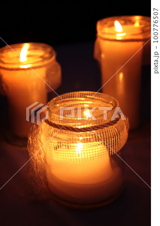 Candles Burning At a Cemetery During All Saints Day 100776507