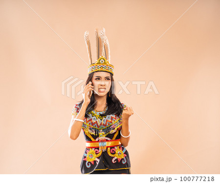 angry asian woman in king bibinge clenched her hand 100777218