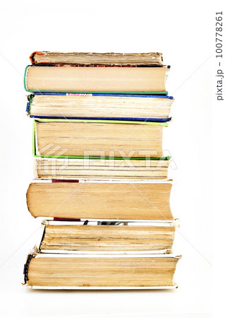 many books standing in a row isolated 100778261