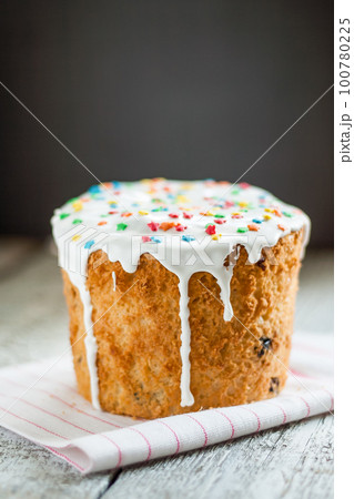 Kulich, Russian Easter bread with a protein cap and colored sprinkles, 100780225