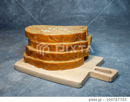 Food on the table. Flour products. rye flour bread with sesame seeds. Cooking  lunch 100787785