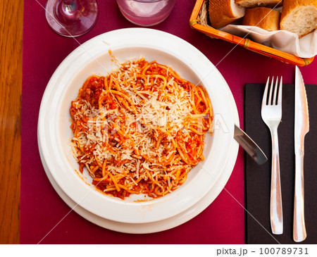 Popular Italian dish is Spaghetti bolognese Popular Italian dish is Spaghetti bolognese 100789731