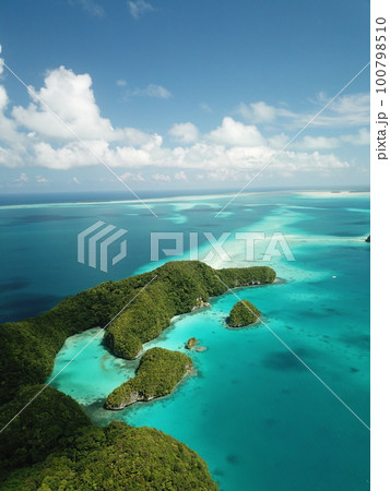 Pristine blue ocean, rock islands in Palau 100798510