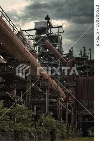 The Pipes and old mining industrial facilities in the Duisburg-Nord Park in Germany 100800523