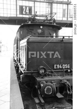 Vertical shot of a historic traditional locomotive at the museum station in Leipzig, Germany Vertical shot of a historic traditional locomotive at the museum station in Leipzig, Germany 100800551