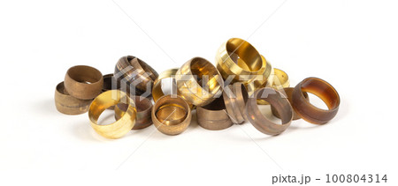 Close up metal and plastic press sleeves 100804314
