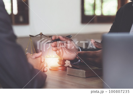 American African Lawyers advice to client about agreement contract. Law, legal services, advice, Justice concept American African Lawyers advice to client about agreement contract. Law, legal services, advice, Justice concept 100807235