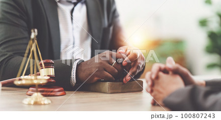 American African Lawyers advice to client about agreement contract. Law, legal services, advice, Justice concept American African Lawyers advice to client about agreement contract. Law, legal services, advice, Justice concept 100807243