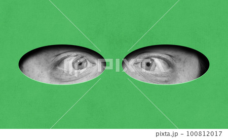 Black and white image of male eyes over green background. Spy, super hero. Cartoon style. Contemporary art collage. Conceptual design. 100812017