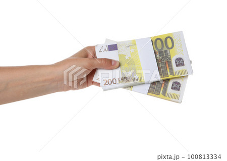 Female hand with Euro money isolated on white background Female hand with Euro money isolated on white background 100813334