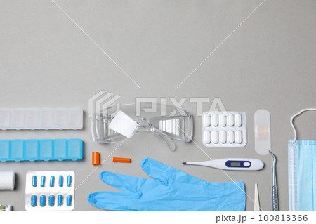 First aid kit supplies on gray background First aid kit supplies on gray background 100813366