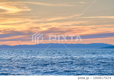 Sunset on Lake Baikal in the Barguzin Bay. Republic of Buryatia, Maksimikha settlement. Sunset on Lake Baikal in the Barguzin Bay. Republic of Buryatia, Maksimikha settlement. 100817024
