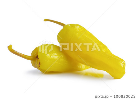 Pickled yellow greek pepper, pepperoncini or friggitelli isolated on white background Pickled yellow greek pepper, pepperoncini or friggitelli isolated on white background 100820025