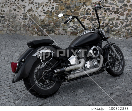 Black classic chopper motorcycle with chrome details Black classic chopper motorcycle with chrome details 100822883