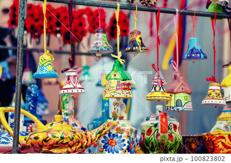 Souvenir bells at the market 100823802