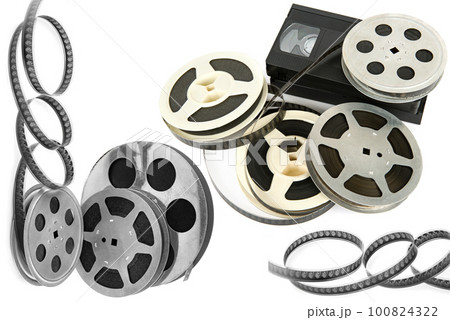 Film reel and video cassette isolated on white . Collage. Film reel and video cassette isolated on white . Collage. 100824322