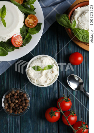 Concept of tasty dairy product - ricotta cheese, top view Concept of tasty dairy product - ricotta cheese, top view 100825228