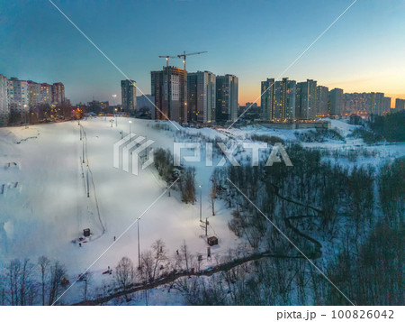 Chernevskaya hill for skiing with a ski lift evening.  To the right of the new district Emerald Hills 100826042