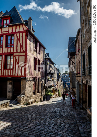 Breton Village Dinan With Narrow Alleys And Half-Timbered Houses In Department Ille et Vilaine In Brittany, France Breton Village Dinan With Narrow Alleys And Half-Timbered Houses In Department Ille et Vilaine In Brittany, France 100826300