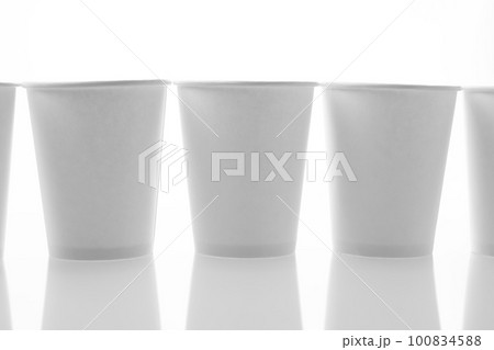empty cardboard glasses close-up on a white background empty cardboard glasses close-up on a white background 100834588