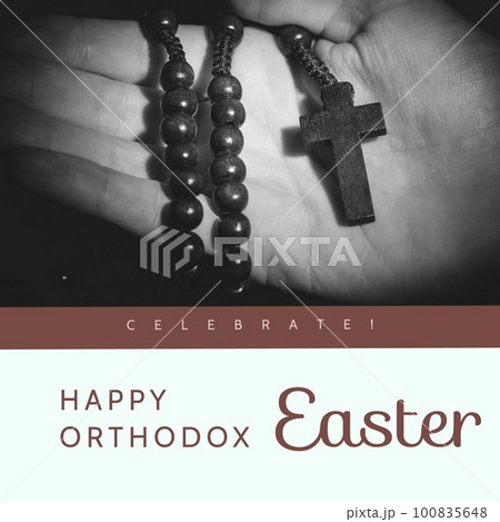 Composite of hand holding wooden rosary beads and celebrate happy orthodox easter text 100835648