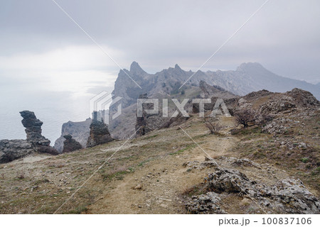Bizarre rocks in Dead city. Khoba-Tele Ridge of Karadag Reserve in spring. Crimea 100837106