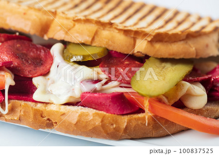 Serving Turkish traditional toast sandwich Turkish name Ayvalik tostu. High quality photo Serving Turkish traditional toast sandwich Turkish name Ayvalik tostu. High quality photo 100837525